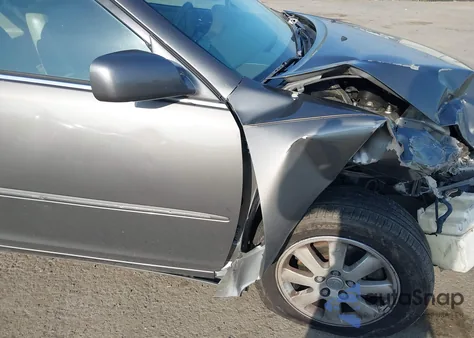 2004 Toyota Camry Xle V6 z USA, uszkodzony, nr VIN 4T1BF32K44U579852